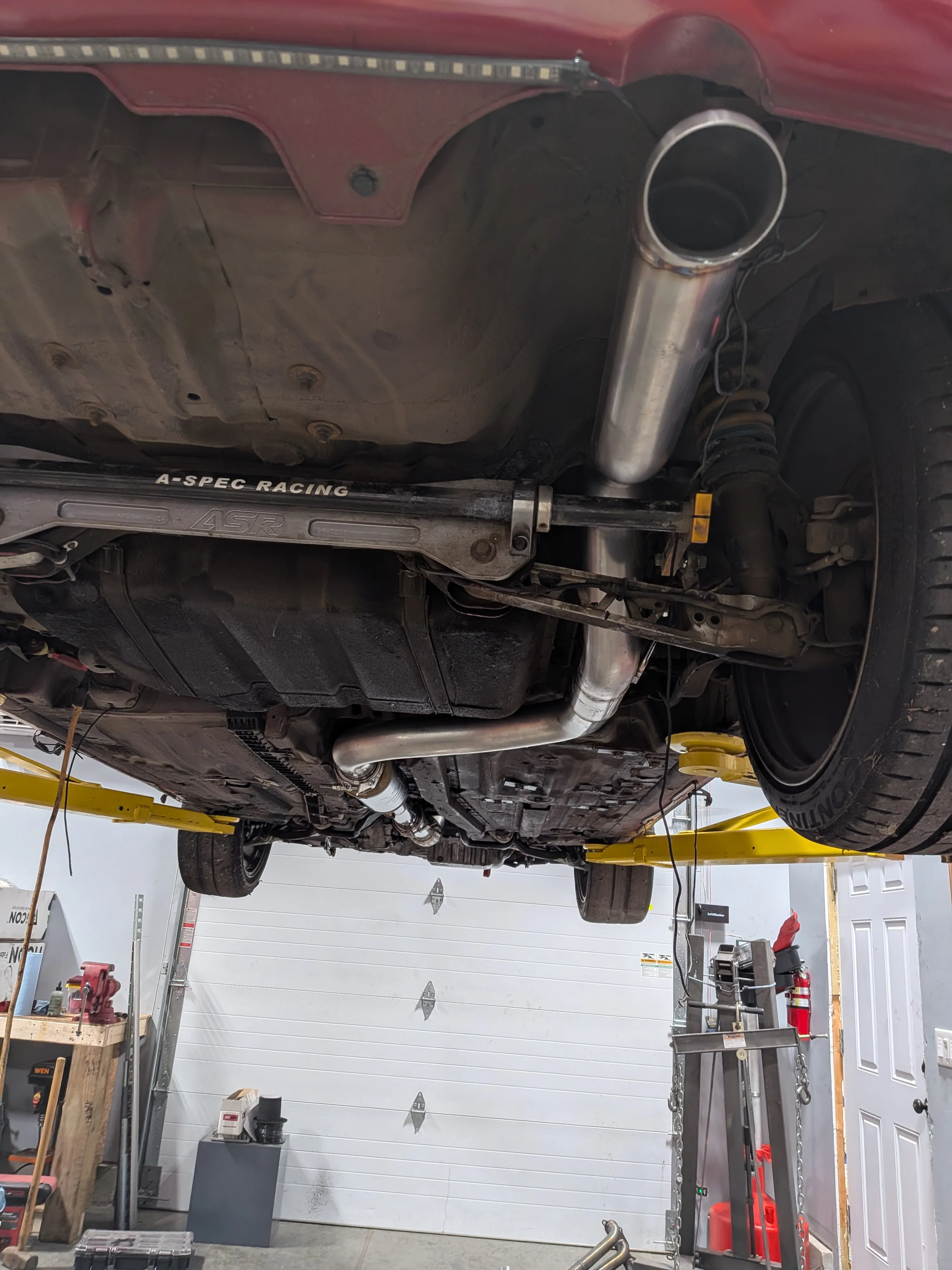 Complete exhaust, from the rear of the car