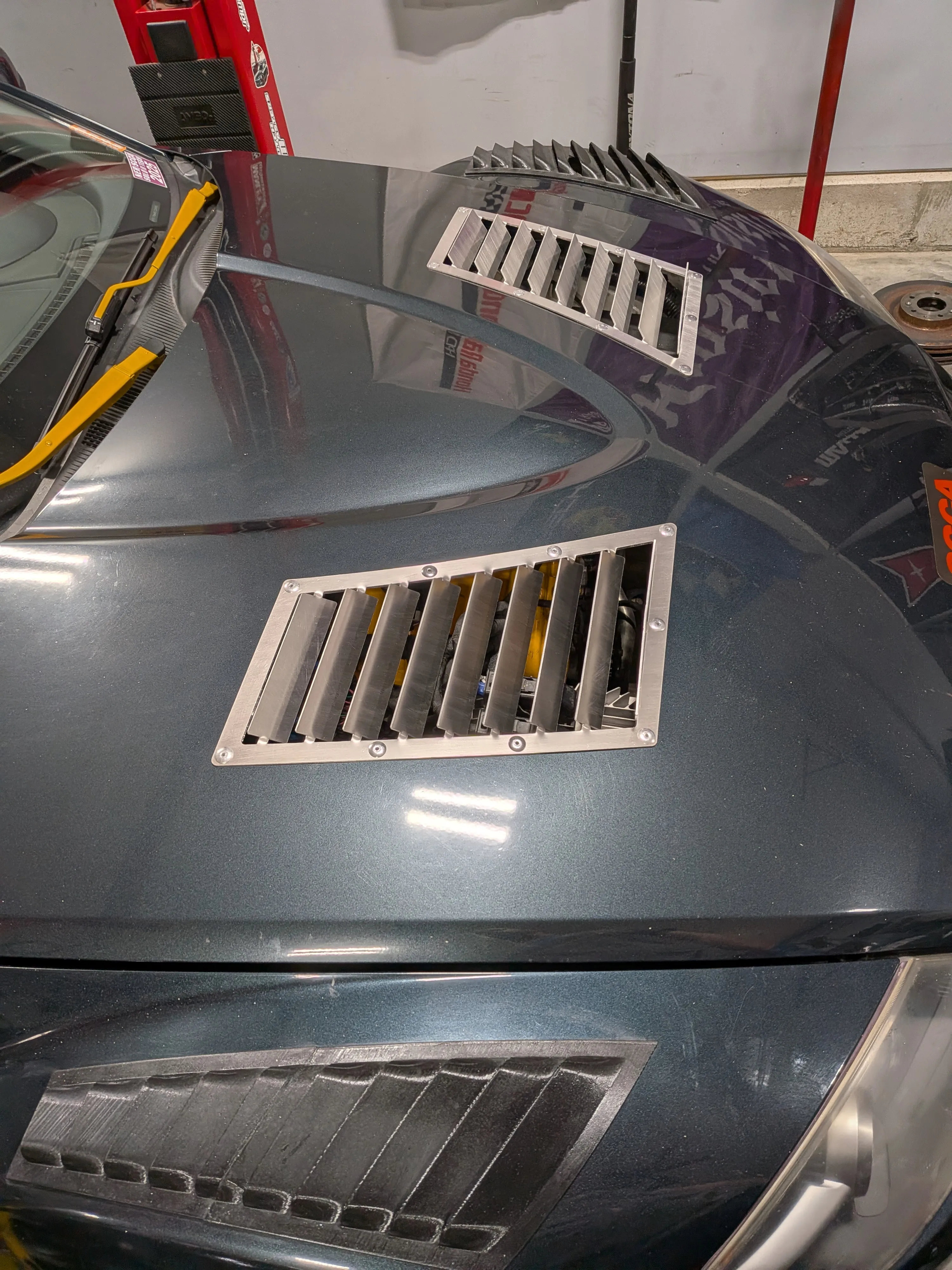 Top-down view of both RX8 hood vents installed